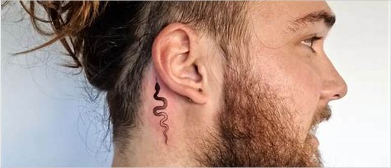 Behind ear tattoo guy